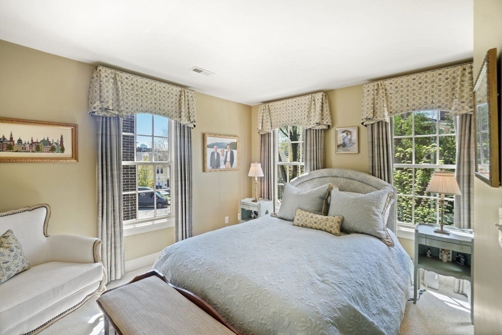 65 Rutherford Avenue Boston, MA 02129 - Photo 9 of 25 a bedroom with a large bed and a window