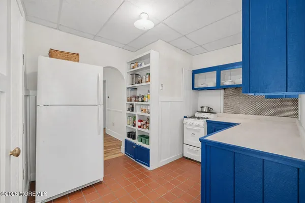 a kitchen with stainless steel appliances a refrigerator and a sink