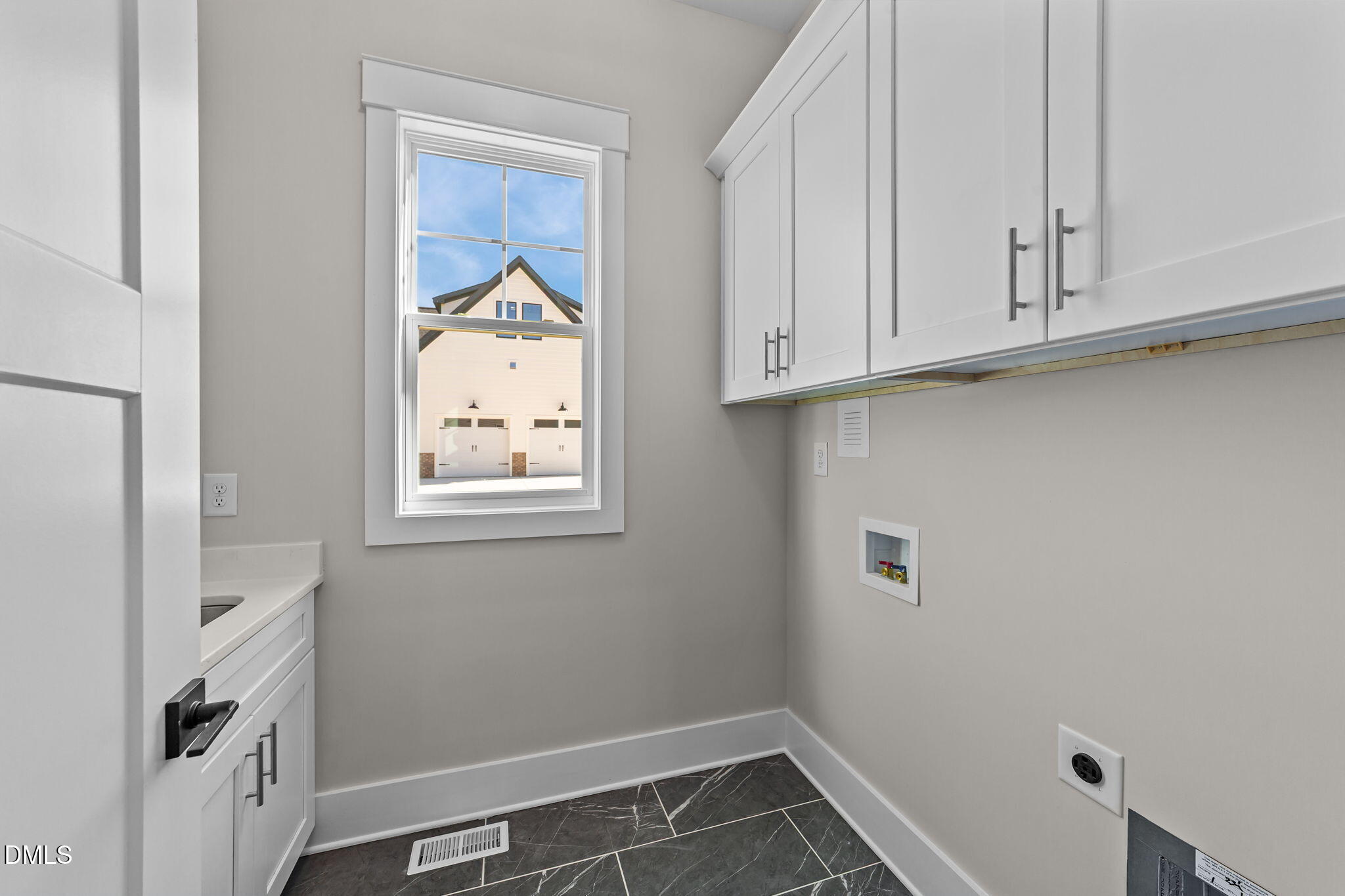 2568 Lassiter Road Four Oaks, NC 27524 - Photo 16 of 45 a view of cabinets and window