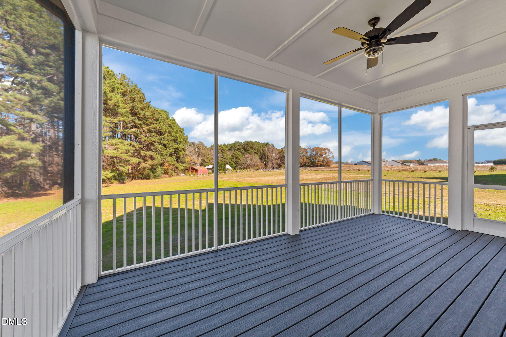 2568 Lassiter Road Four Oaks, NC 27524 - Photo 34 of 45 a view of porch with wooden floor