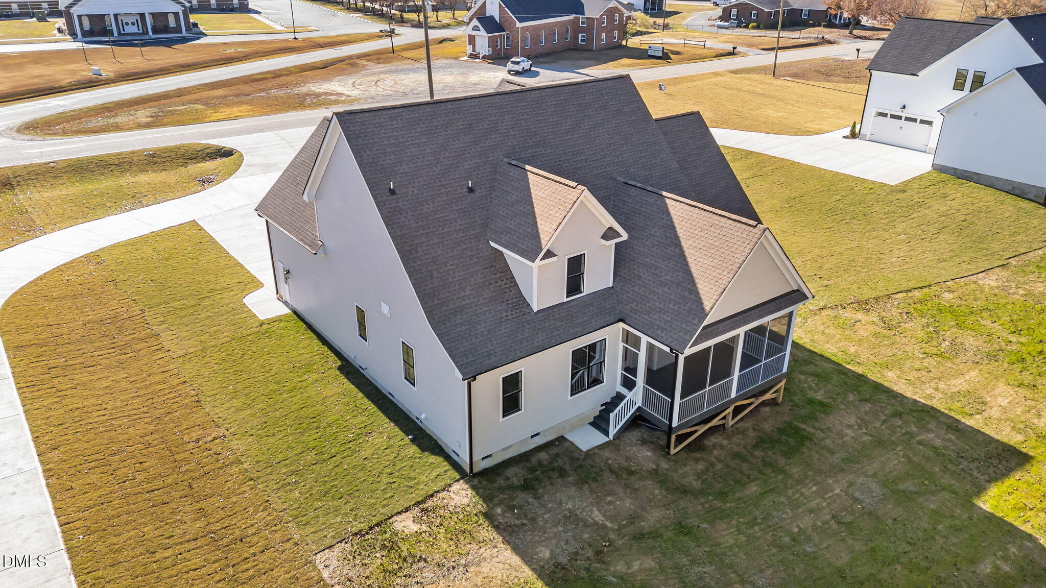 2568 Lassiter Road Four Oaks, NC 27524 - Photo 41 of 45 a aerial view of a house with a ocean view