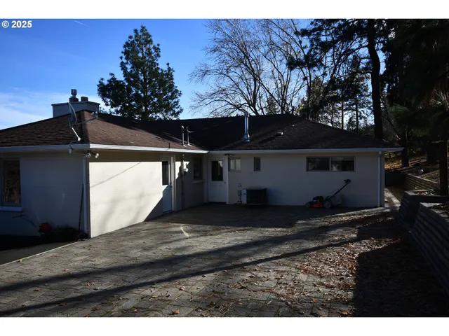 a view of house with outdoor space
