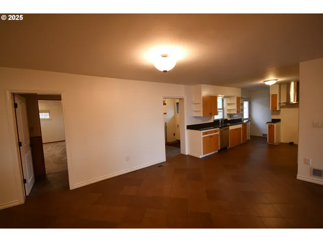 a view of a kitchen with a sink
