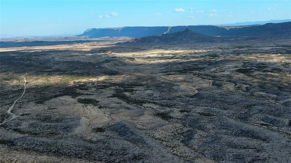 100 Needle Peak Road Terlingua, TX 79852 - Photo 2 of 20 a view of an ocean and beach