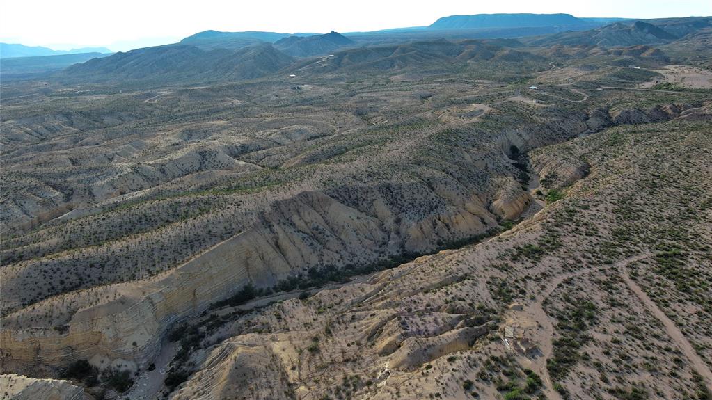 100 Needle Peak Road Terlingua, TX 79852 - Photo 8 of 20 a view of a dry yard