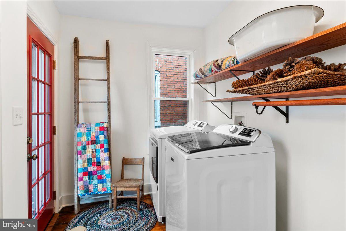 338 East Church Street Frederick, MD 21701 - Photo 23 of 54 a utility room with dryer and washer