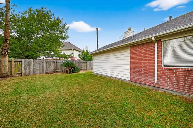 a view of a backyard with a garden