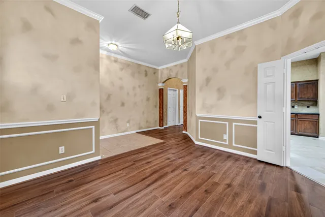 a view of a livingroom with wooden floor
