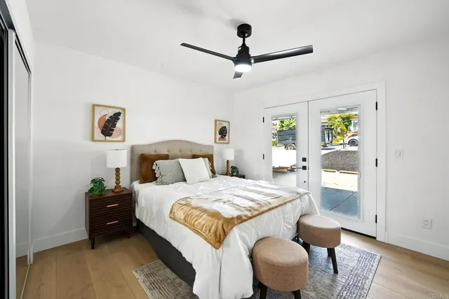 a bedroom with a bed and a chair