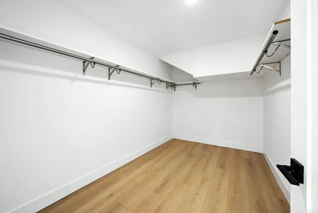 a view of a room with racks on the wall