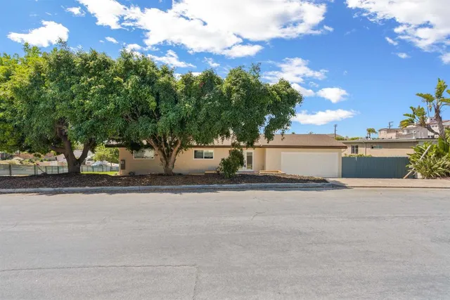 front view of a house with a street
