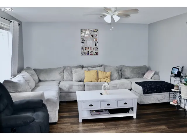 a living room with furniture and a couch