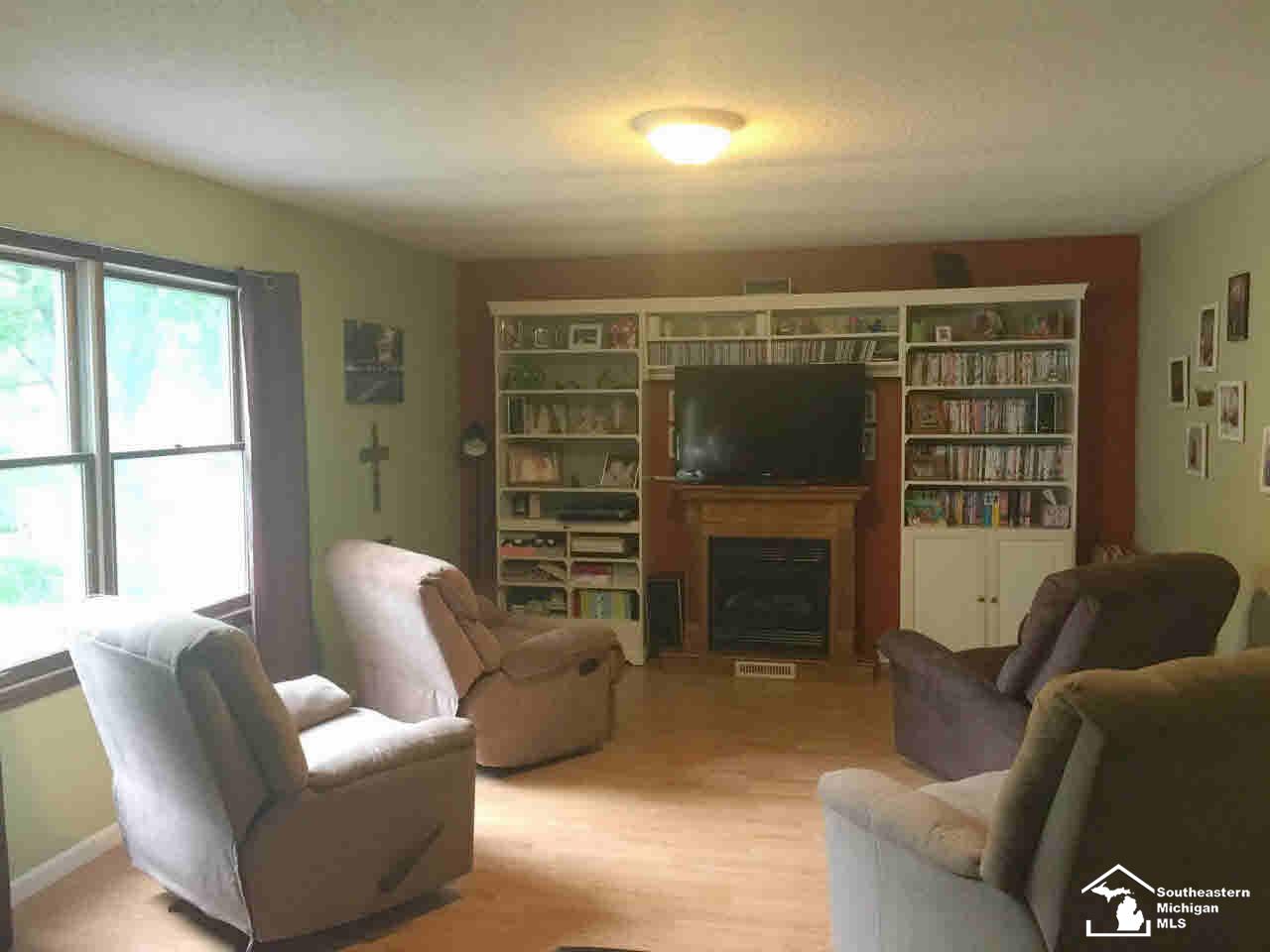 1932 West Sterns Road Temperance, MI 48182 - Photo 4 of 13 Family Room W/Fireplace
