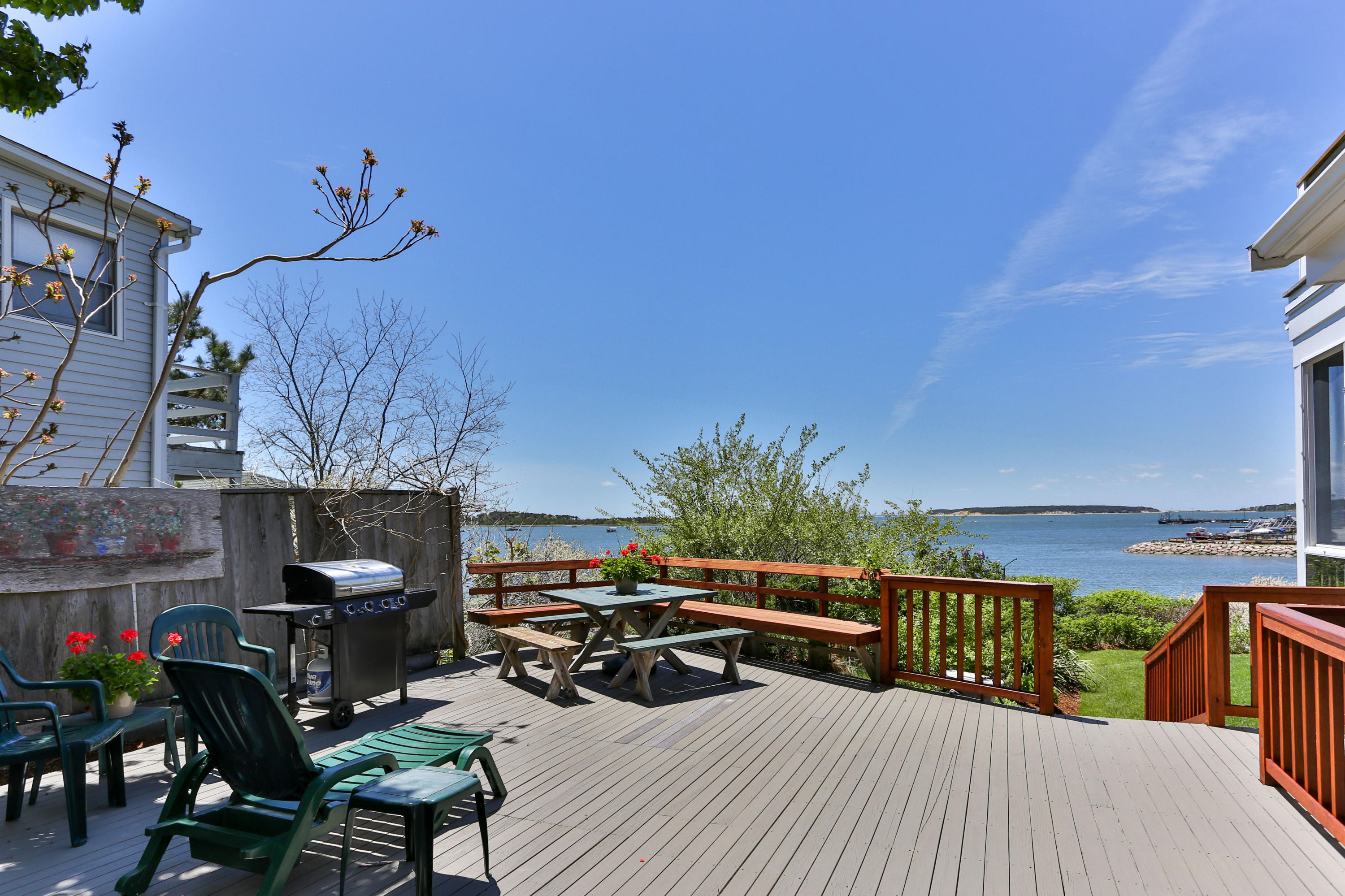 137 Nauhaught Bluff Road Wellfleet, MA 02667 - Photo 15 of 33 a view of a balcony with chairs