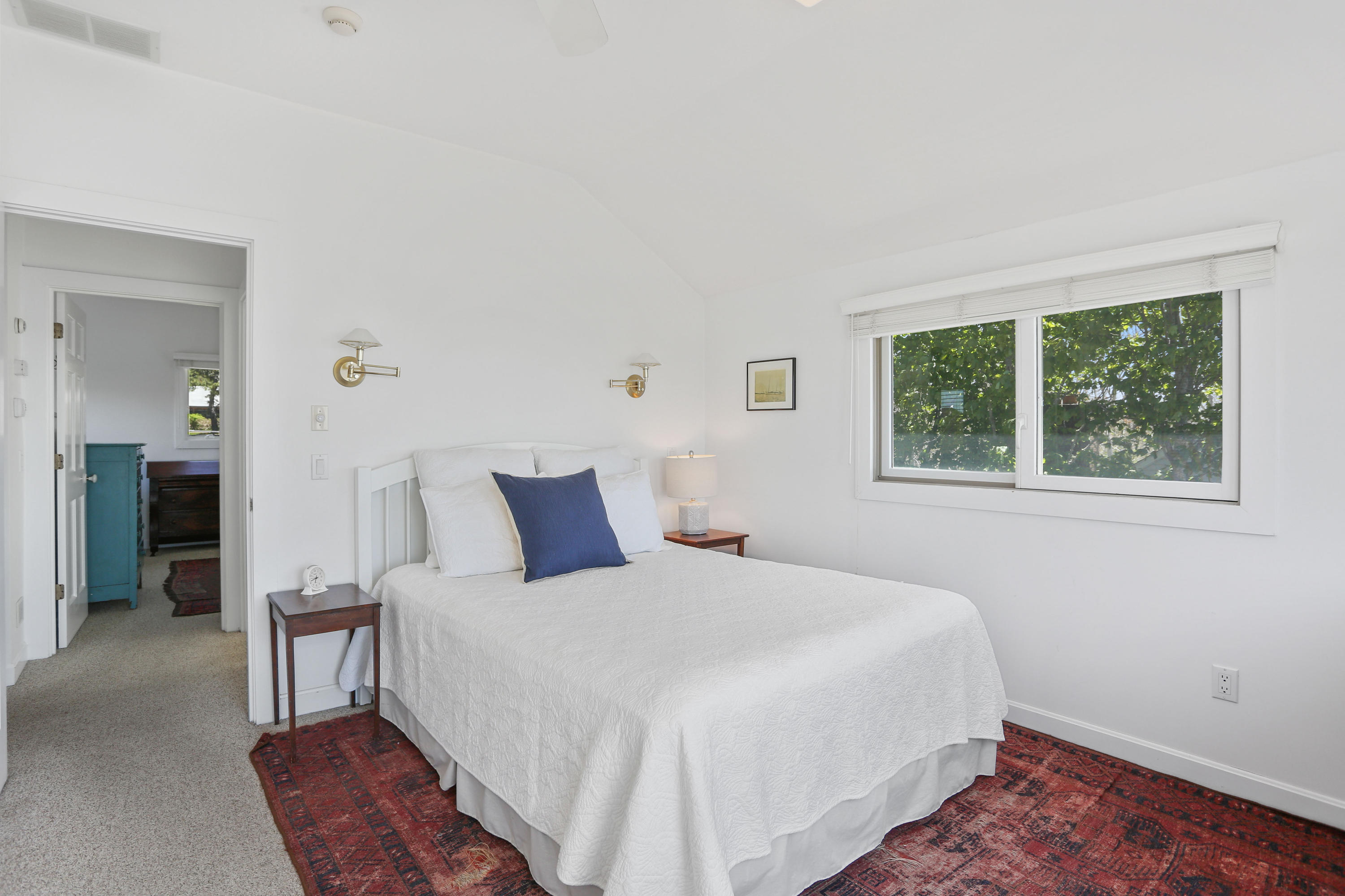 137 Nauhaught Bluff Road Wellfleet, MA 02667 - Photo 20 of 33 a bedroom with a bed and a window