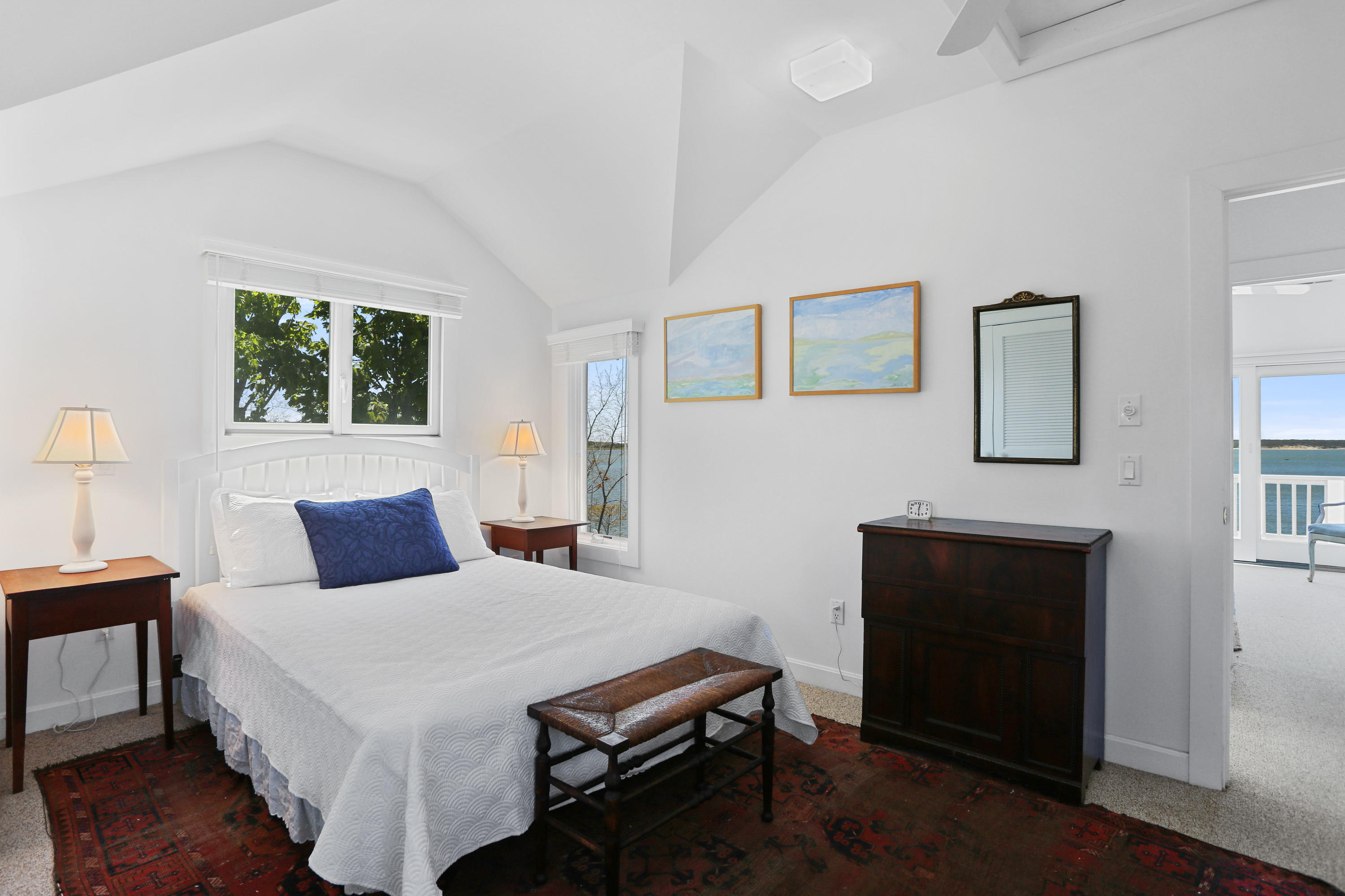 137 Nauhaught Bluff Road Wellfleet, MA 02667 - Photo 22 of 33 a bedroom with a bed and a window