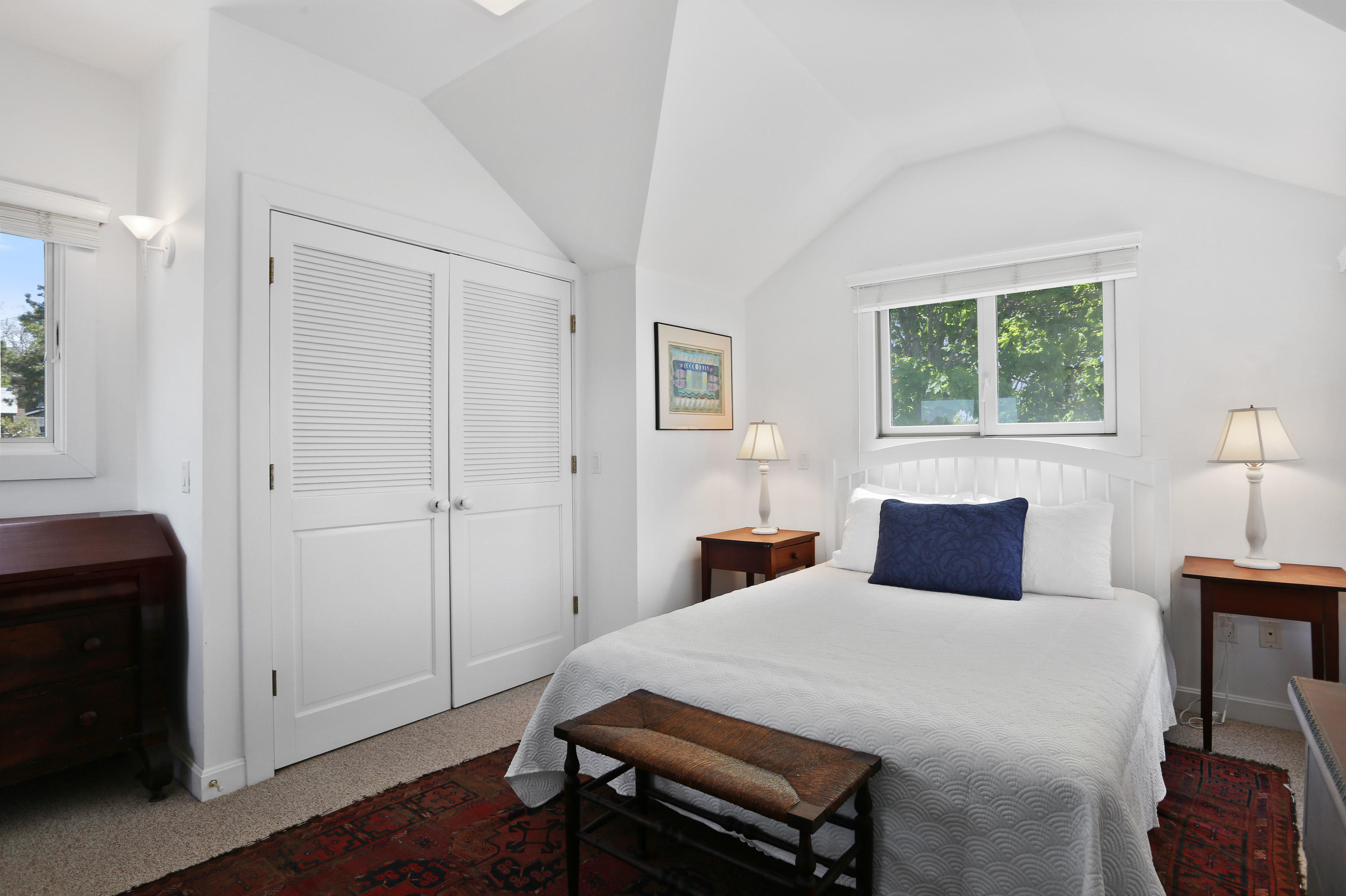 137 Nauhaught Bluff Road Wellfleet, MA 02667 - Photo 23 of 33 a bedroom with a bed and a closet