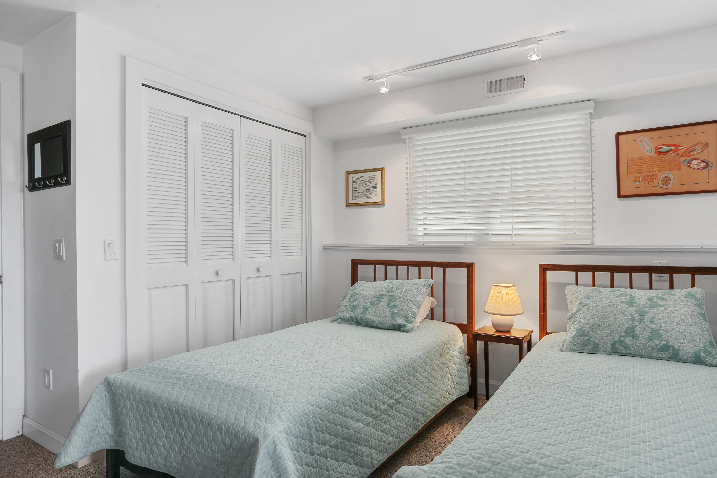 137 Nauhaught Bluff Road Wellfleet, MA 02667 - Photo 26 of 33 a bedroom with a bed and a tv