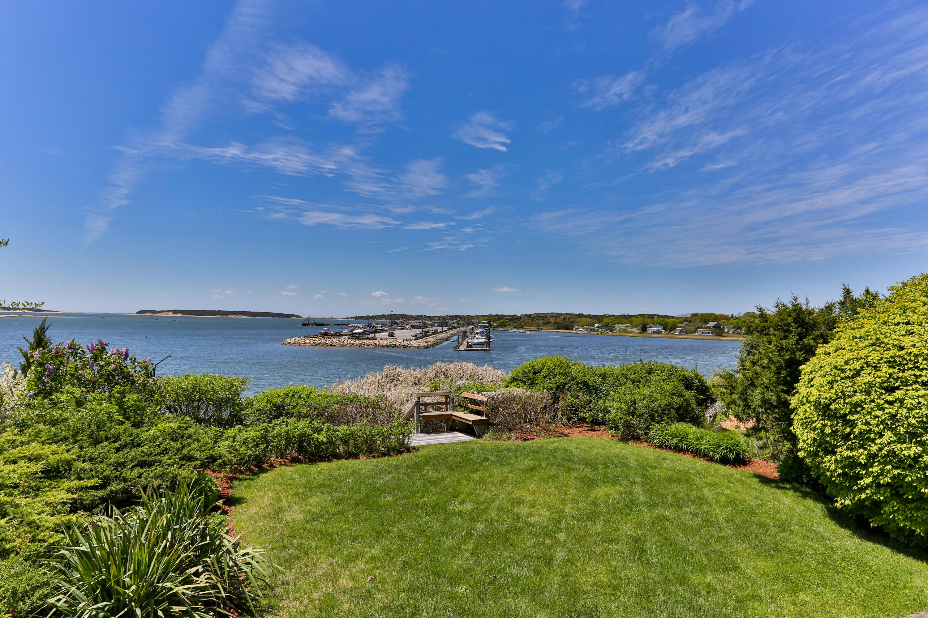 137 Nauhaught Bluff Road Wellfleet, MA 02667 - Photo 28 of 33 a view of a pathway both side of grassy field with shrub