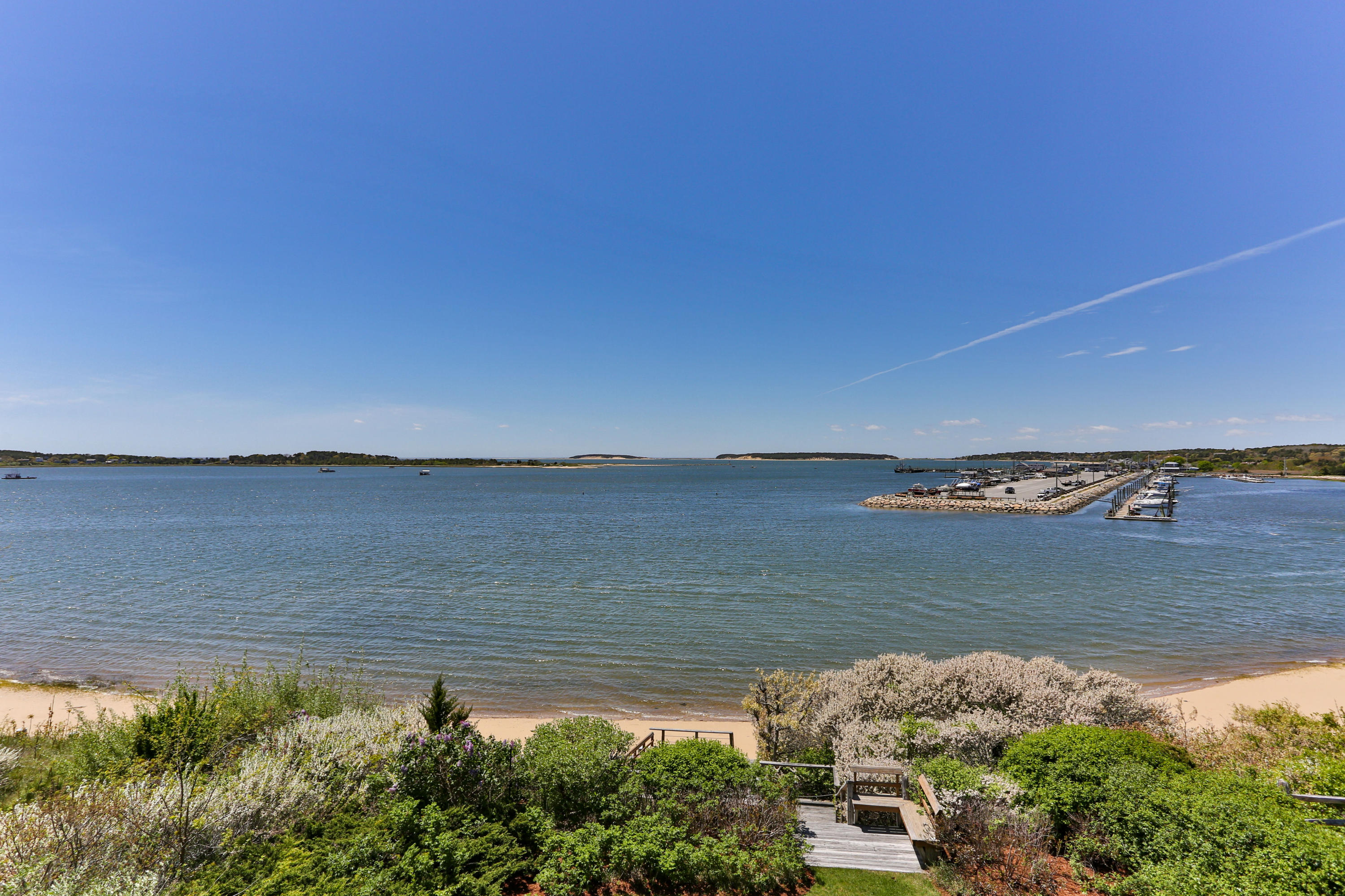 137 Nauhaught Bluff Road Wellfleet, MA 02667 - Photo 29 of 33 a view of a lake with a lake in the background