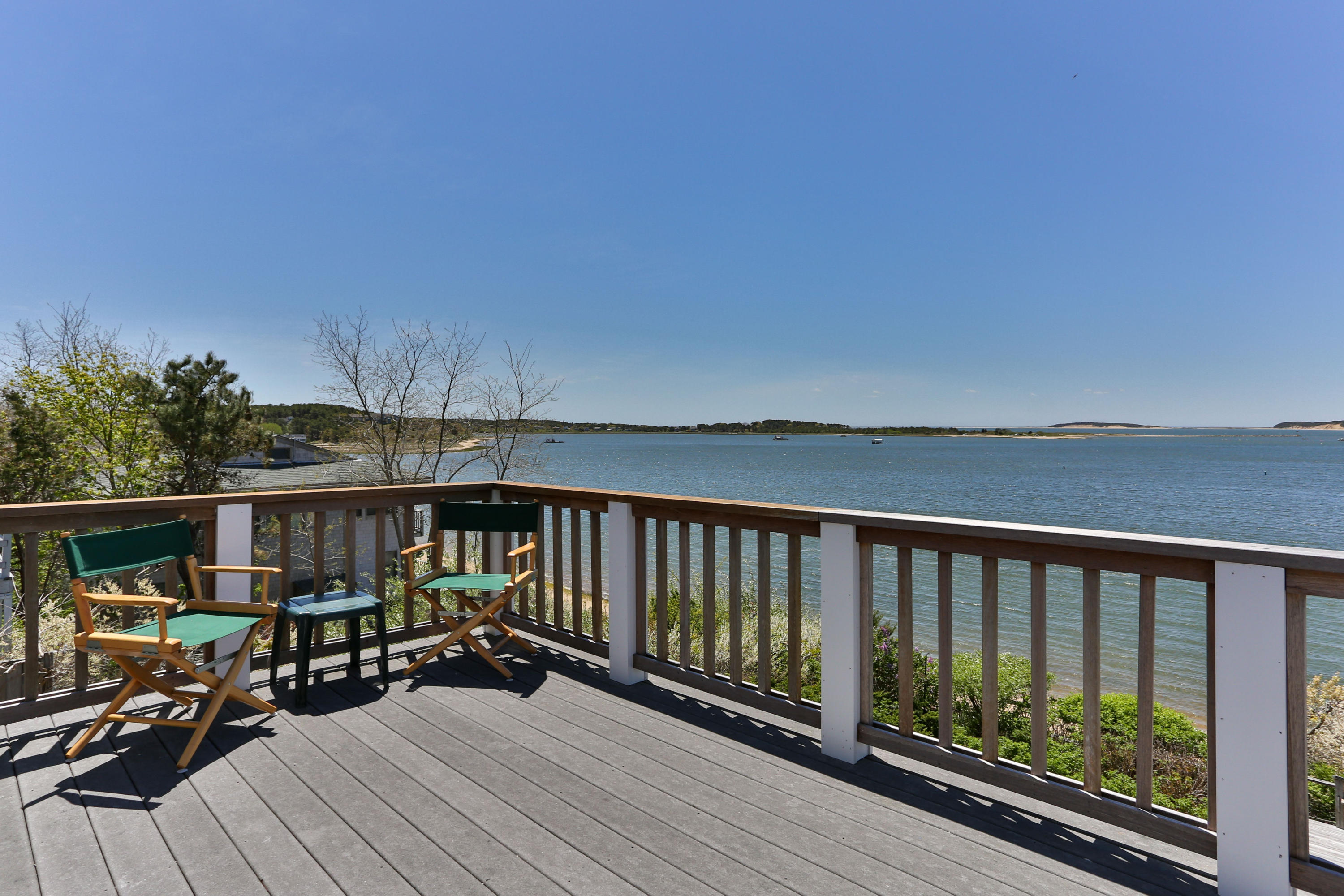 137 Nauhaught Bluff Road Wellfleet, MA 02667 - Photo 4 of 33 a view of balcony with wooden floor and seating space