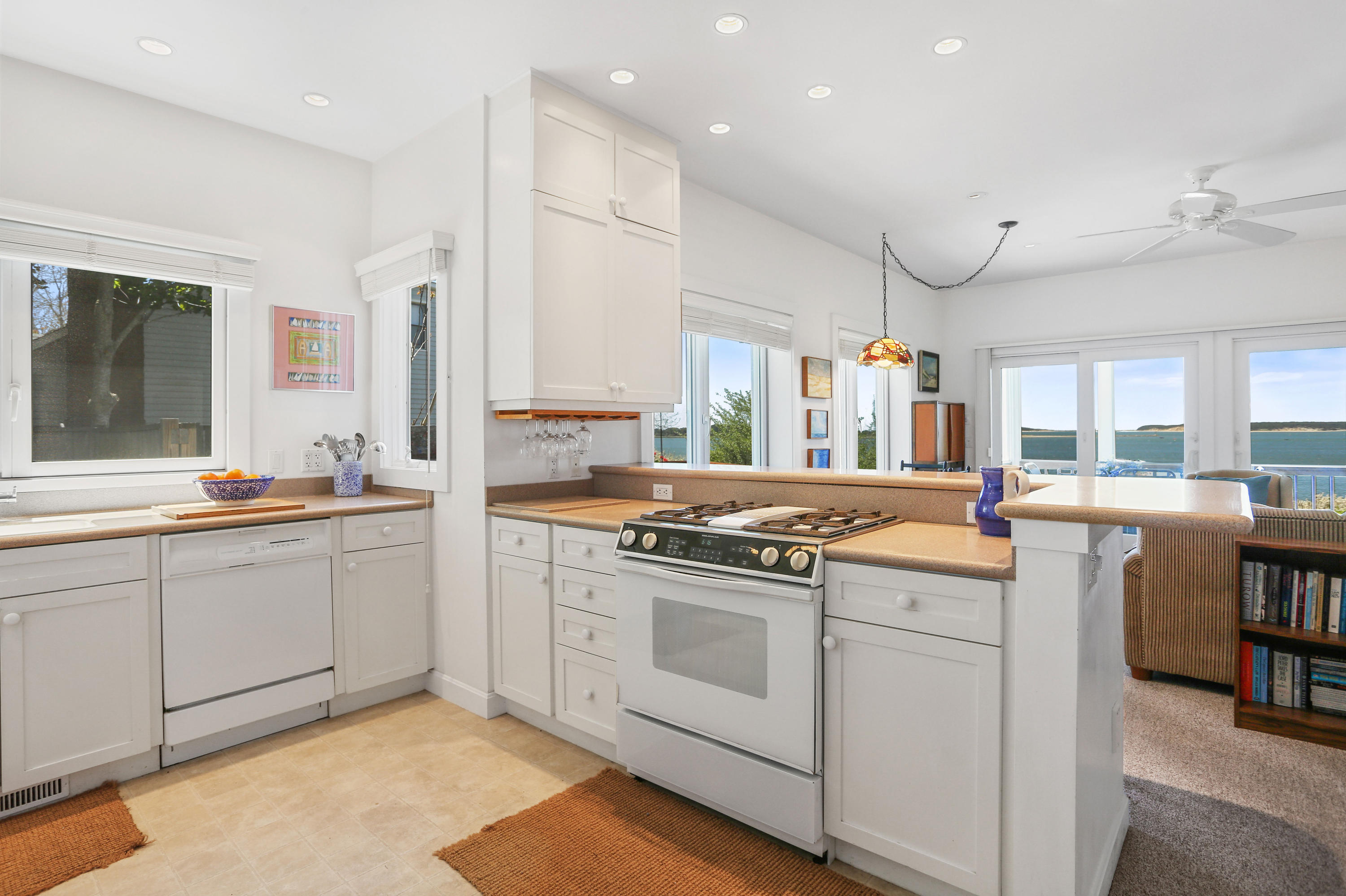 137 Nauhaught Bluff Road Wellfleet, MA 02667 - Photo 5 of 33 a kitchen with appliances cabinets and a sink