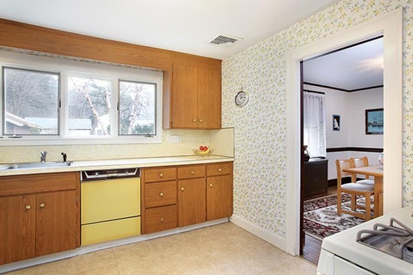 172 Winslow Road Newton, MA 02468 - Photo 3 of 5 a kitchen with stainless steel appliances granite countertop a stove a sink and a microwave