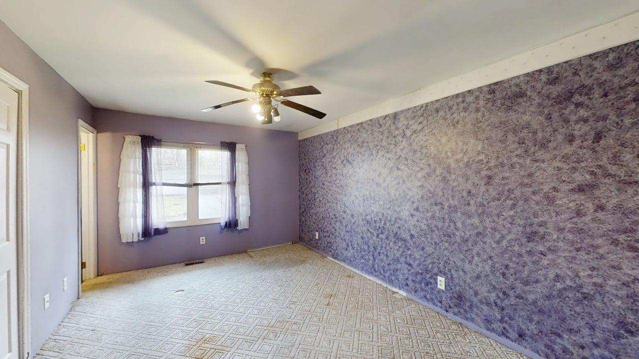 1002 Goldenview Drive Champaign, IL 61821 - Photo 14 of 38 wooden floor in an empty room with a window