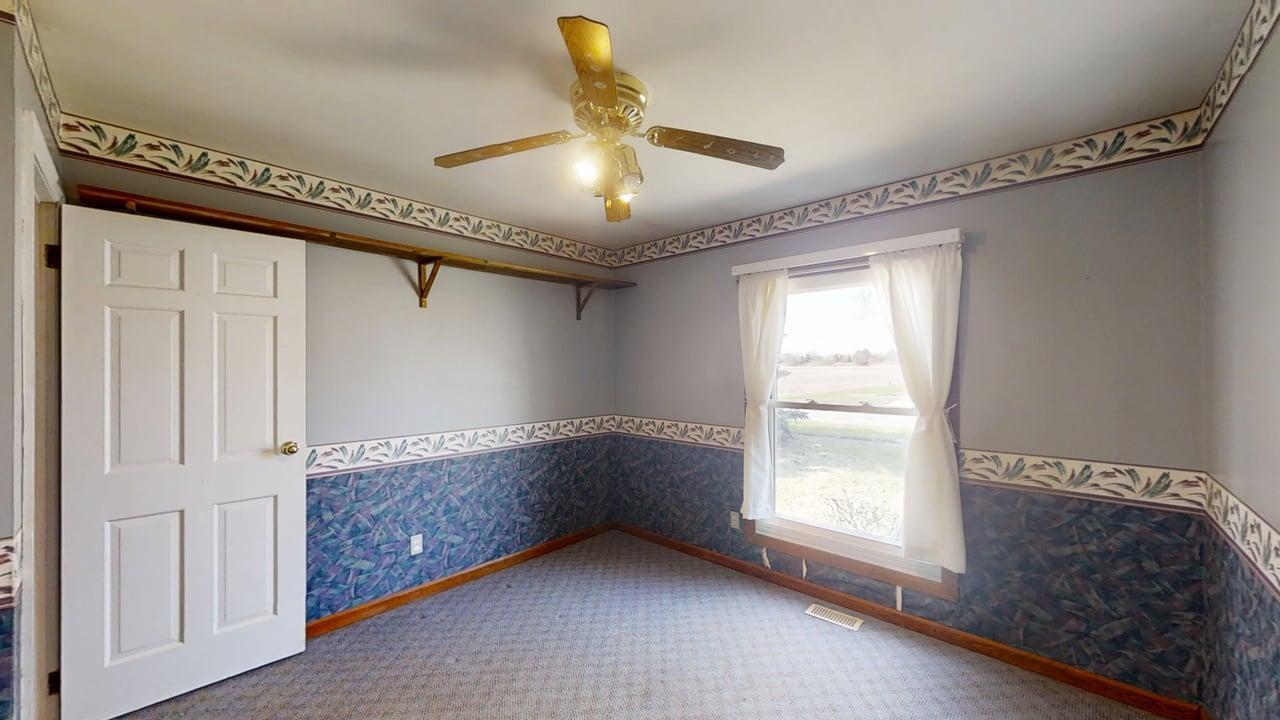 1002 Goldenview Drive Champaign, IL 61821 - Photo 26 of 38 a view of an empty room with a window