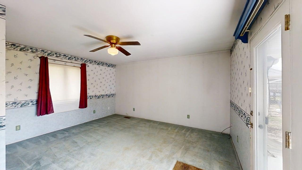 1002 Goldenview Drive Champaign, IL 61821 - Photo 31 of 38 a view of room with window and ceiling fan