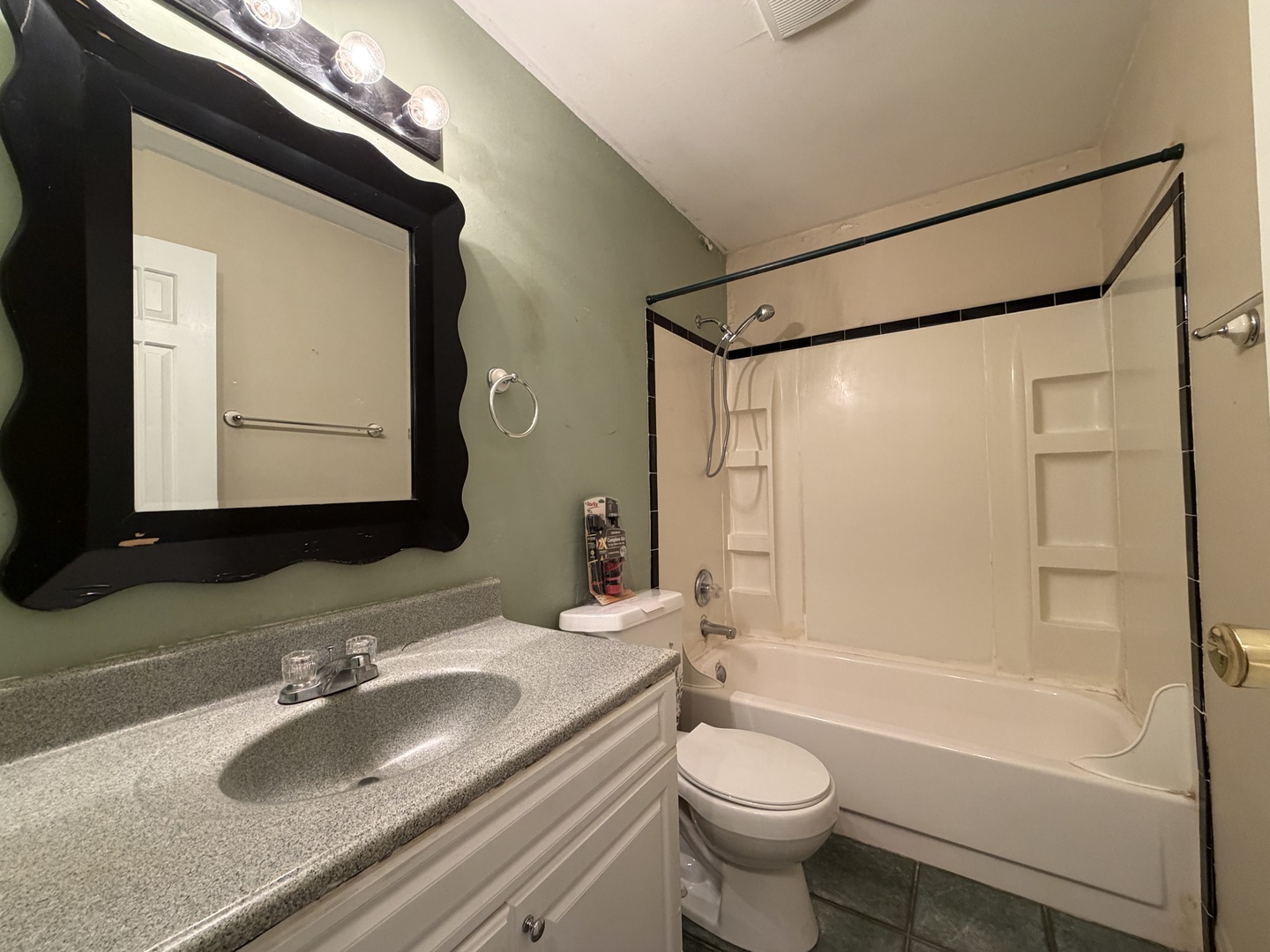 1002 Goldenview Drive Champaign, IL 61821 - Photo 32 of 38 a bathroom with a granite countertop sink toilet and shower