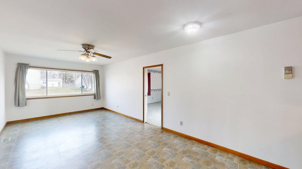 1002 Goldenview Drive Champaign, IL 61821 - Photo 7 of 38 a view of an empty room with windows