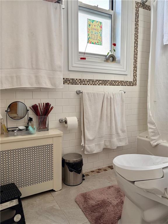 1077 Bay Ridge Parkway Brooklyn, NY 11228 - Photo 4 of 16 a bathroom with a toilet and a sink