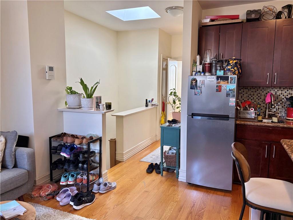 1077 Bay Ridge Parkway Brooklyn, NY 11228 - Photo 5 of 16 a view of a living room and dining room