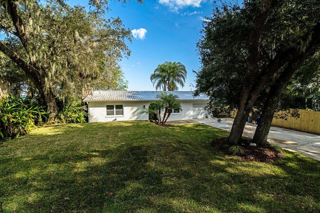 149 Pompano Road St. Augustine, FL 32086 - Photo 1 of 35 a view of a yard in front of house