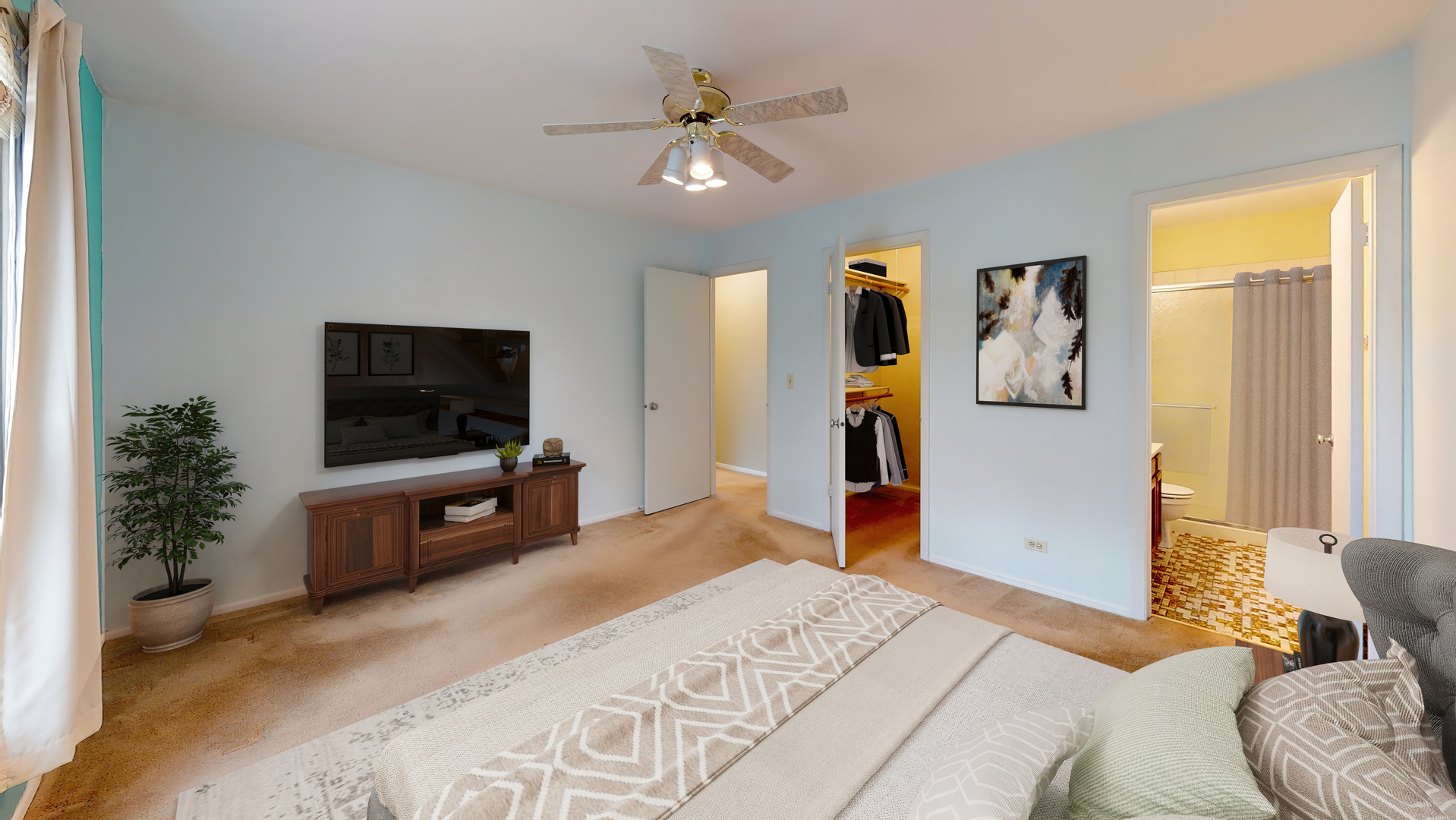 4730 Calvert Drive, Unit B2 Rolling Meadows, IL 60008 - Photo 11 of 20 a bedroom with a bed and a flat screen tv