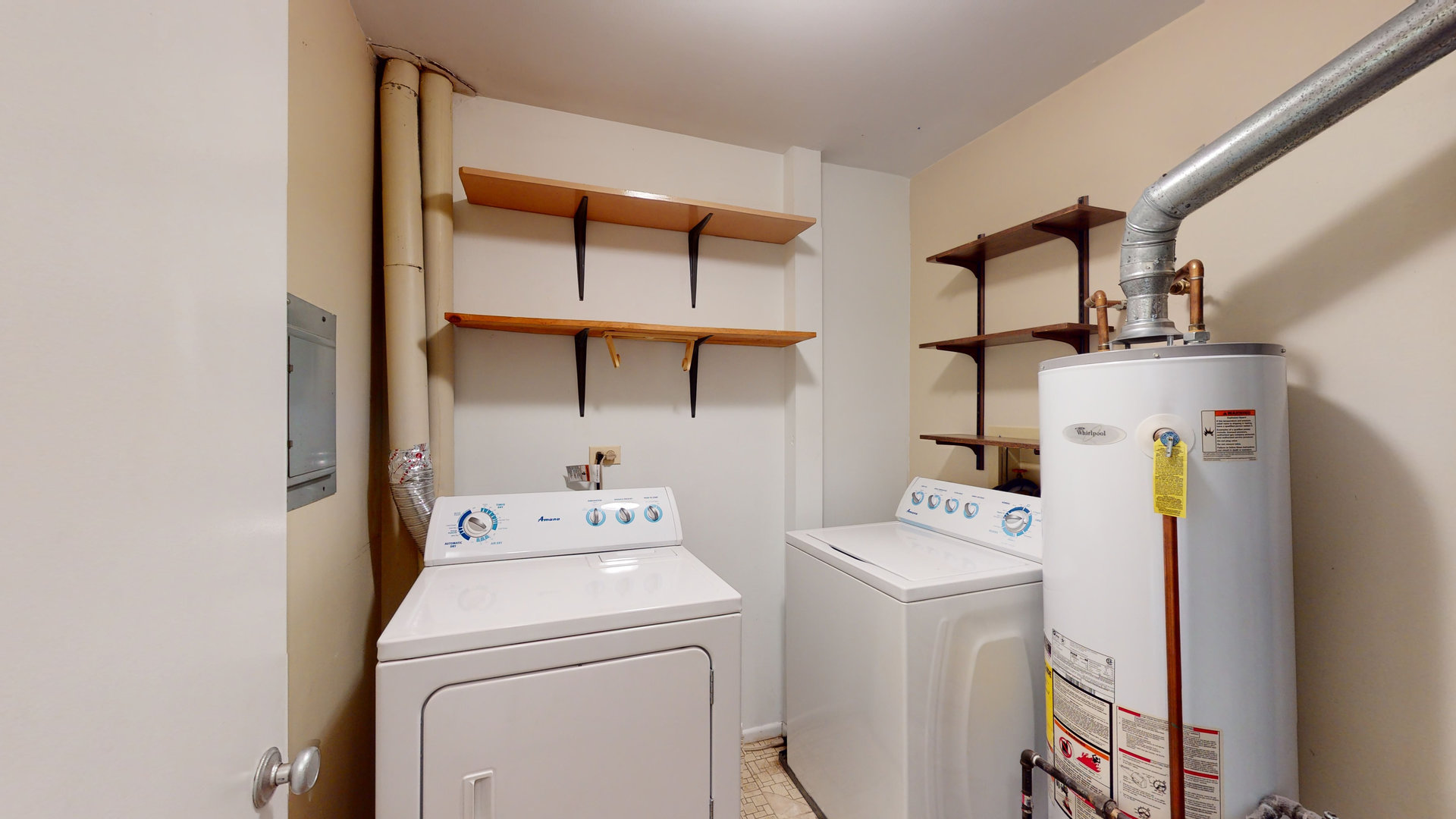 4730 Calvert Drive, Unit B2 Rolling Meadows, IL 60008 - Photo 16 of 20 a utility room with dryer and washer