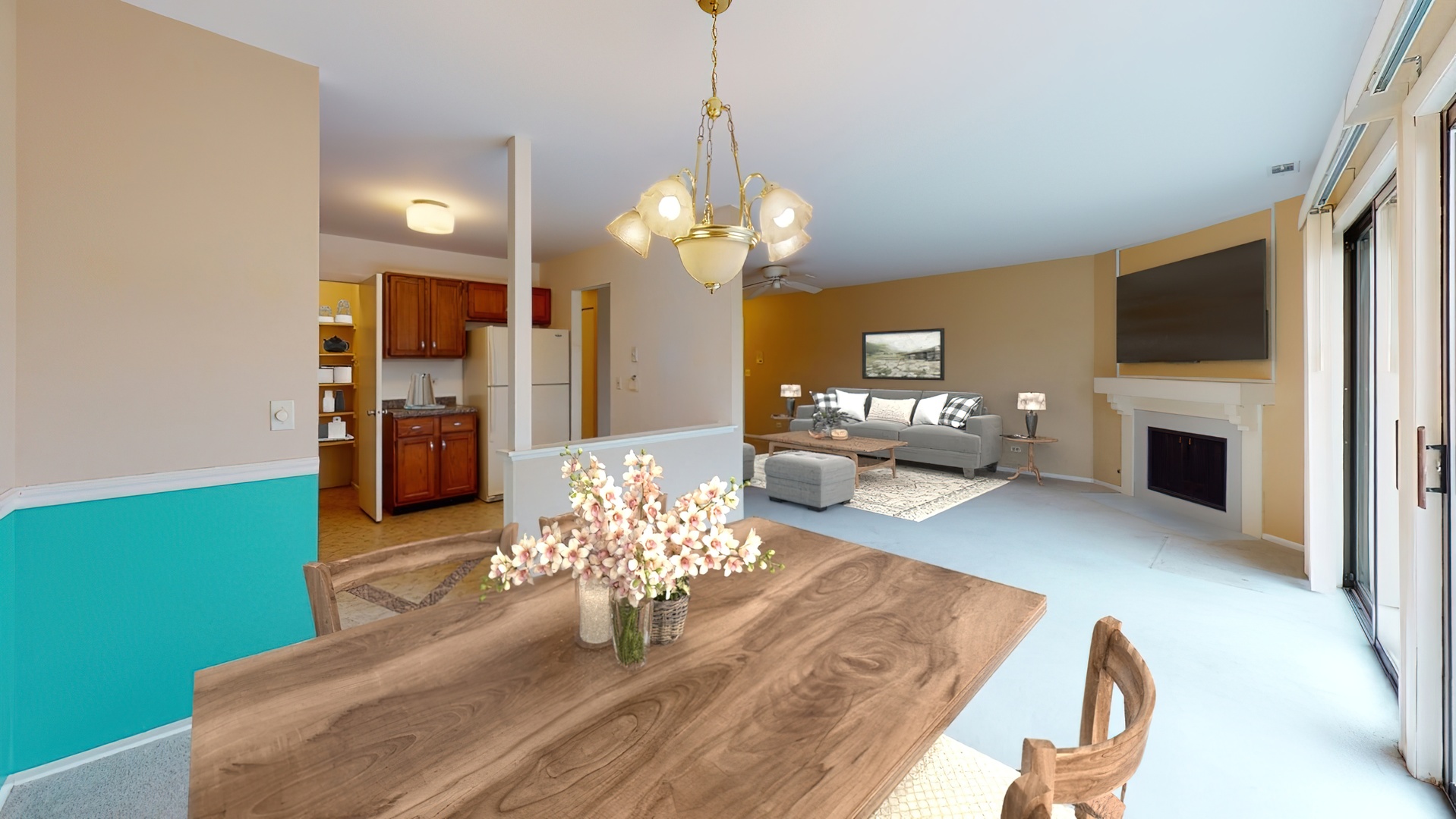 4730 Calvert Drive, Unit B2 Rolling Meadows, IL 60008 - Photo 5 of 20 a living room with fireplace furniture and a flat screen tv