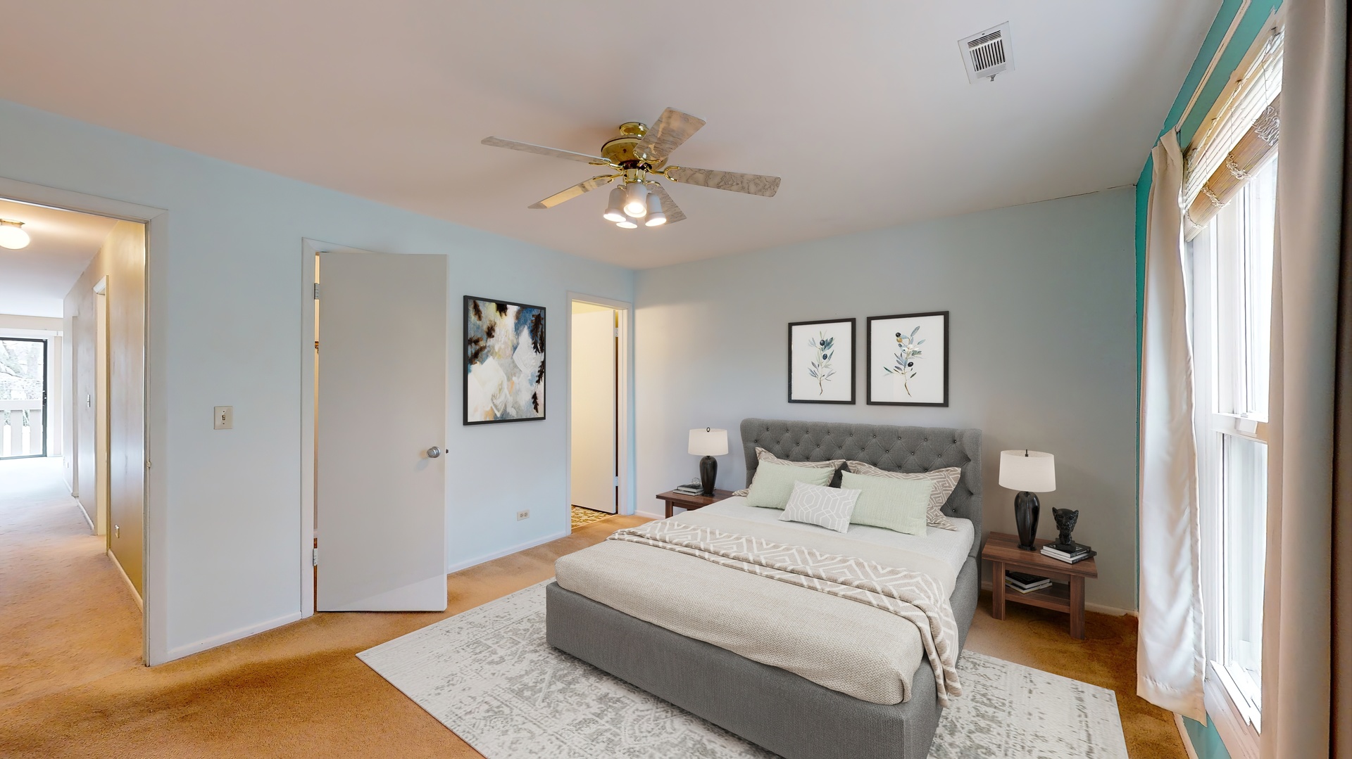 4730 Calvert Drive, Unit B2 Rolling Meadows, IL 60008 - Photo 10 of 20 a bedroom with a bed and a chandelier