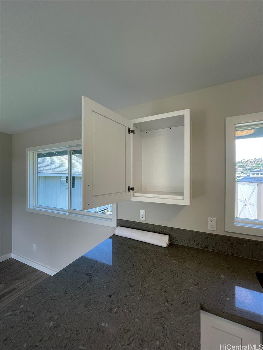 45-143 William Henry Road, Unit D Kaneohe, HI 96744 - Photo 3 of 9 an empty room with windows