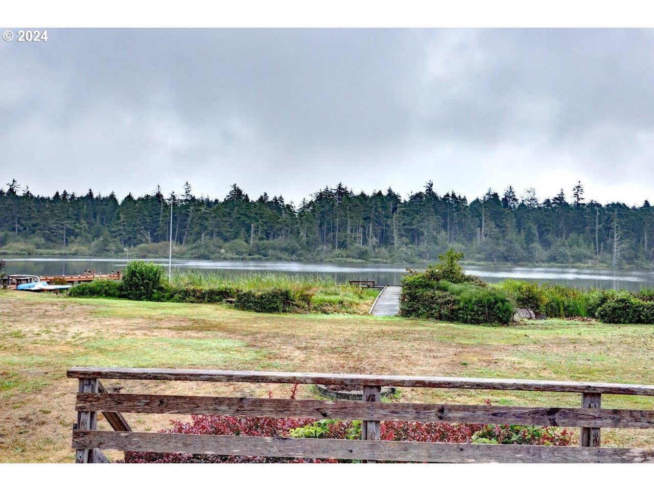 19414 U Street Long Beach, WA 98631 - Photo 2 of 39 a view of a yard with a table and chairs