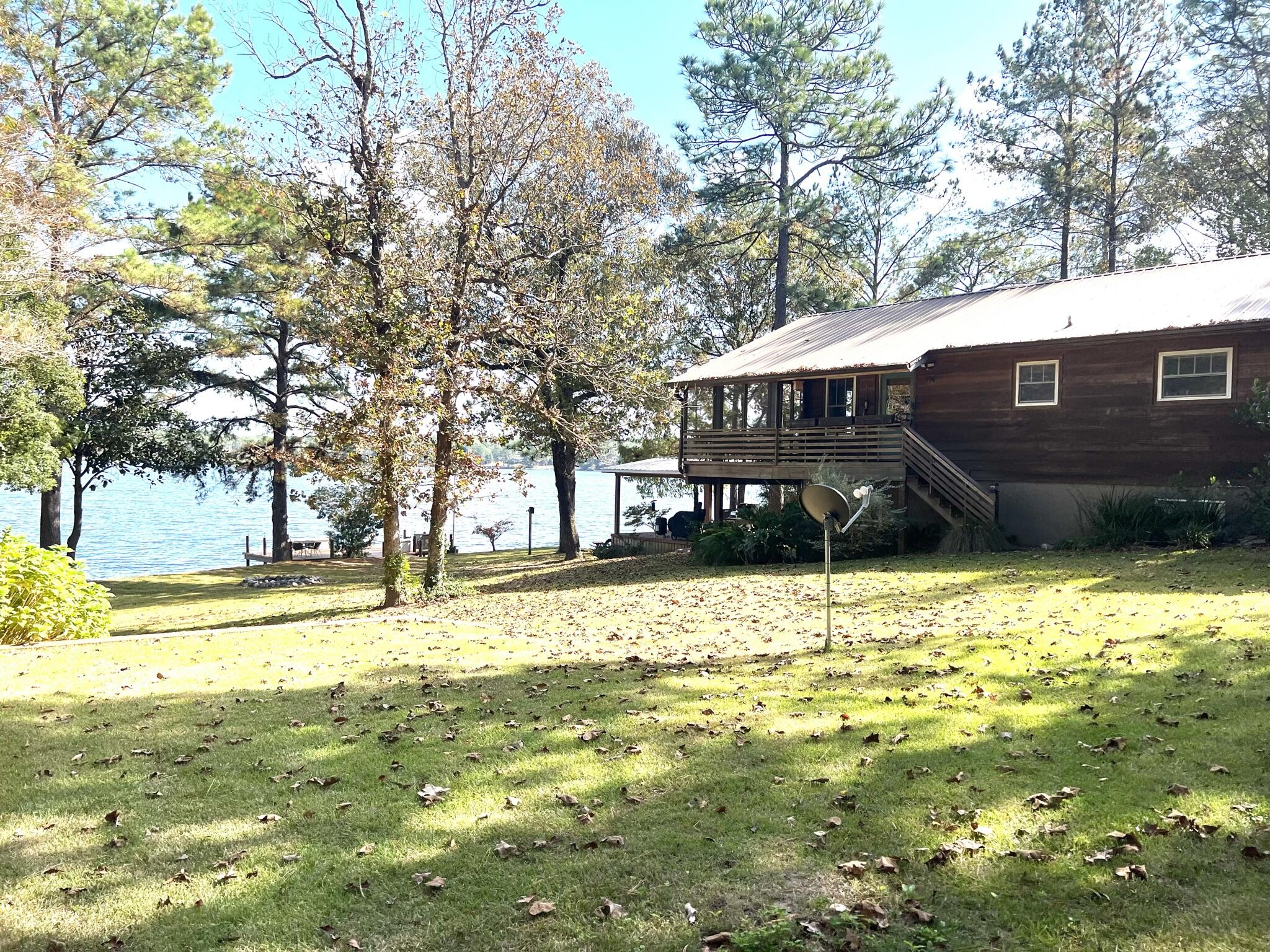 914 Spring Lake Road DeFuniak Springs, FL 32433 - Photo 1 of 78 a view of a house with a yard