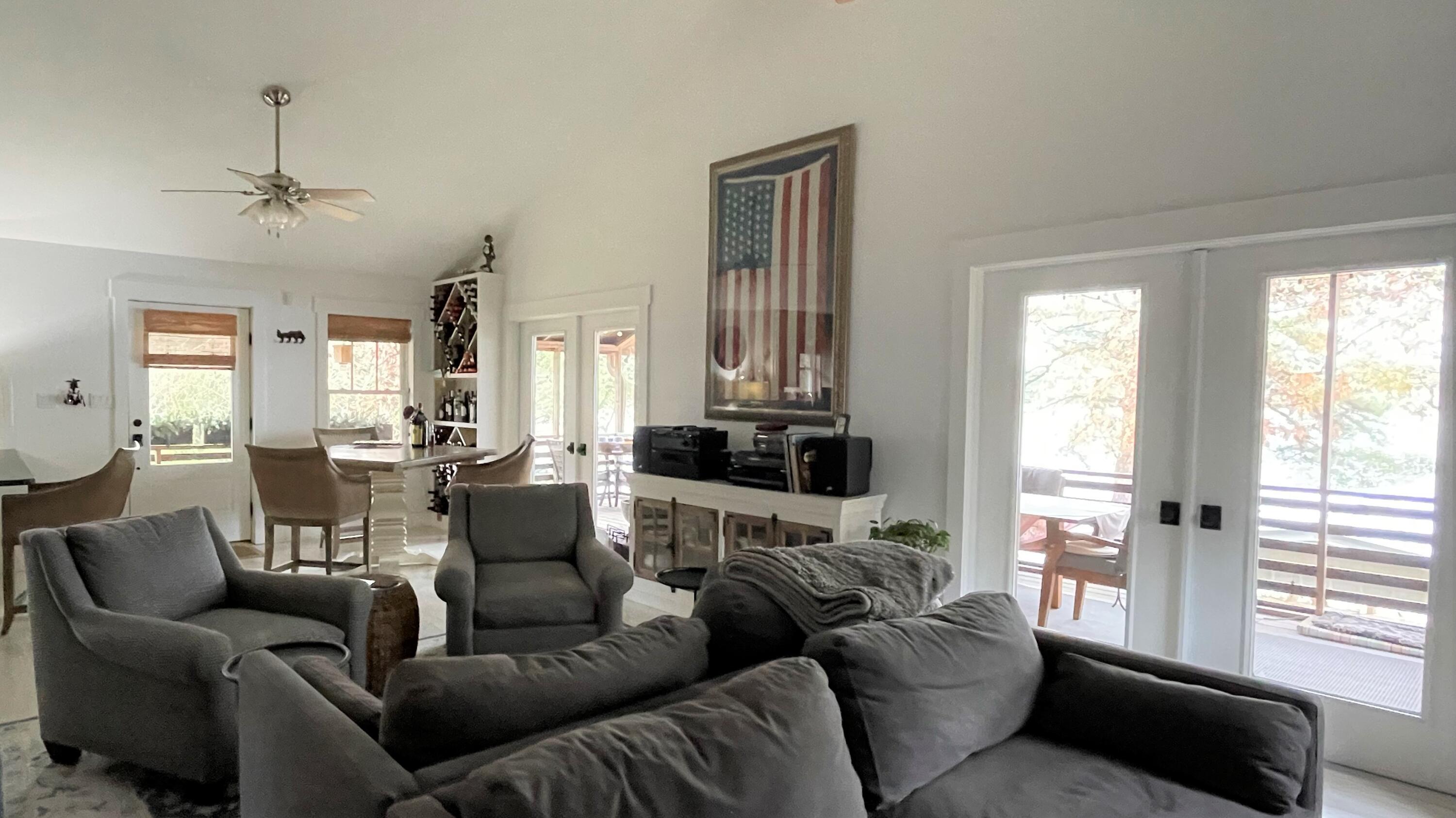 914 Spring Lake Road DeFuniak Springs, FL 32433 - Photo 12 of 78 a living room with furniture and a large window