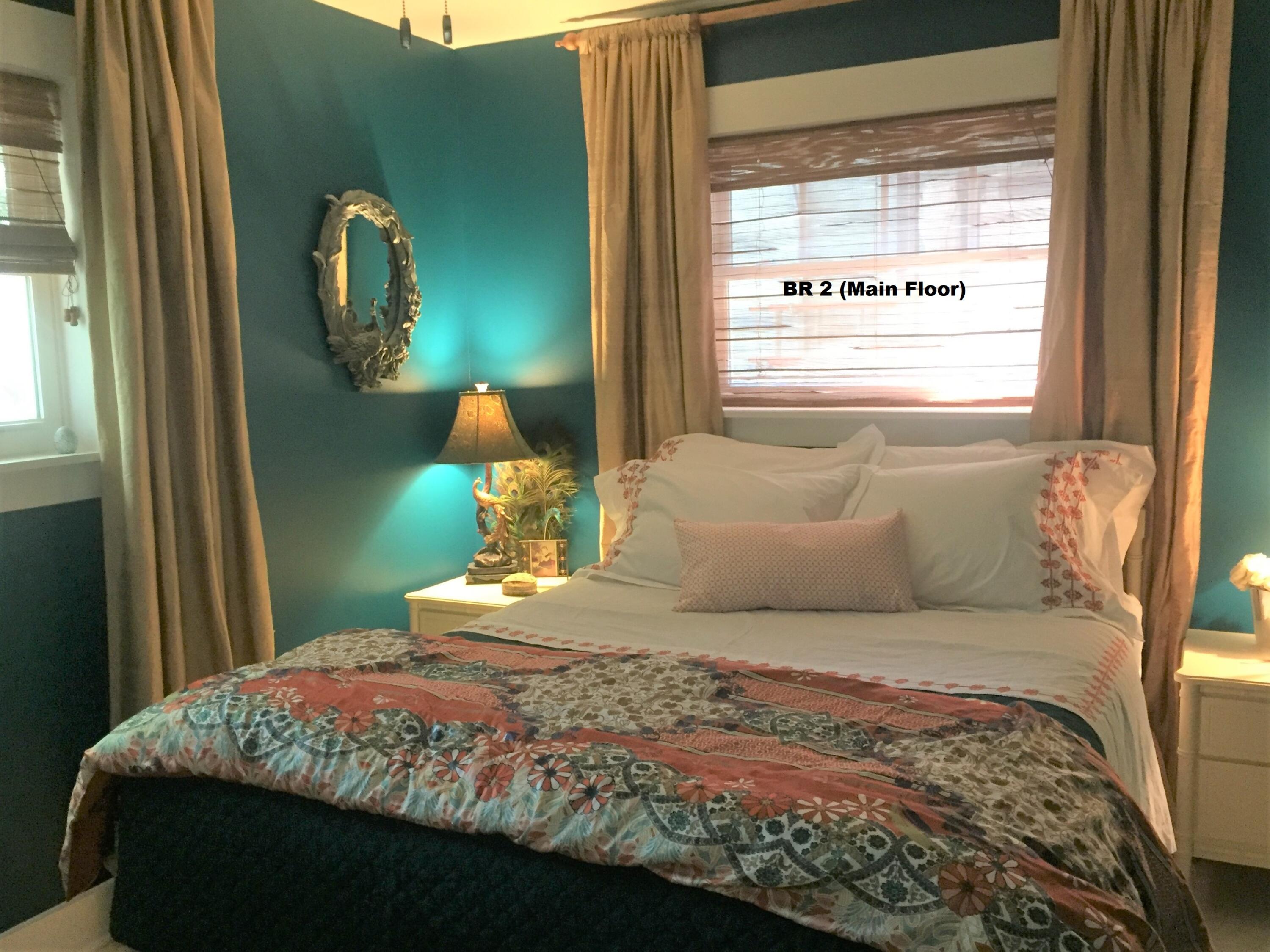 914 Spring Lake Road DeFuniak Springs, FL 32433 - Photo 19 of 78 a bedroom with a bed and window