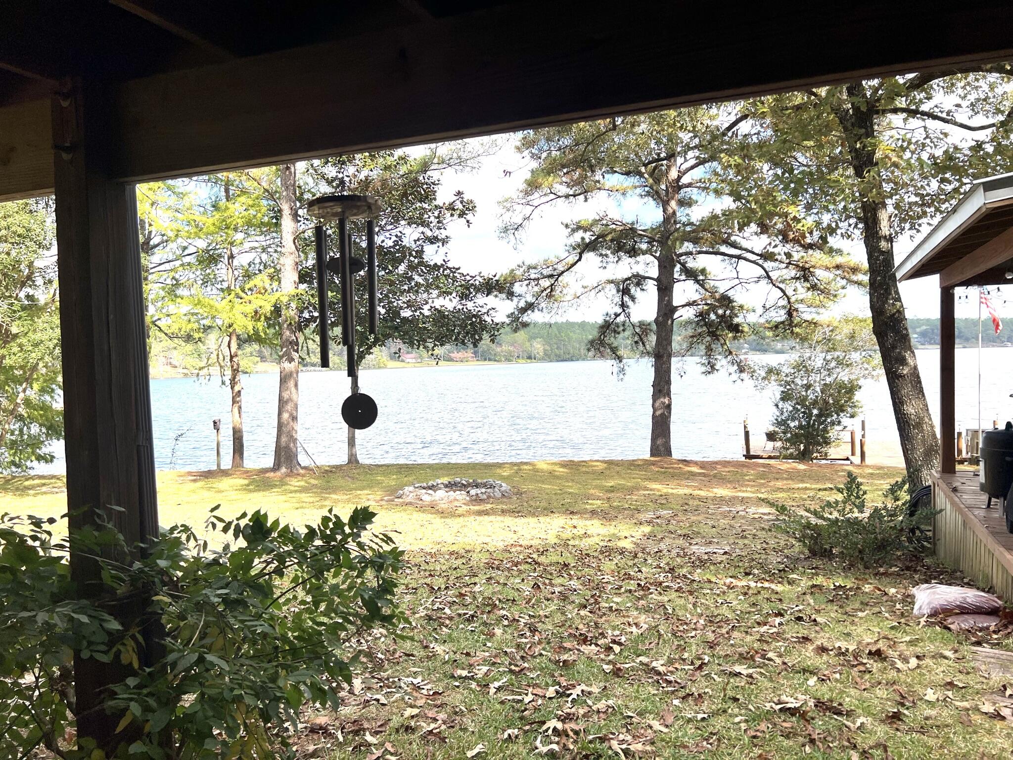 914 Spring Lake Road DeFuniak Springs, FL 32433 - Photo 60 of 78 a view of a yard with an outdoor space