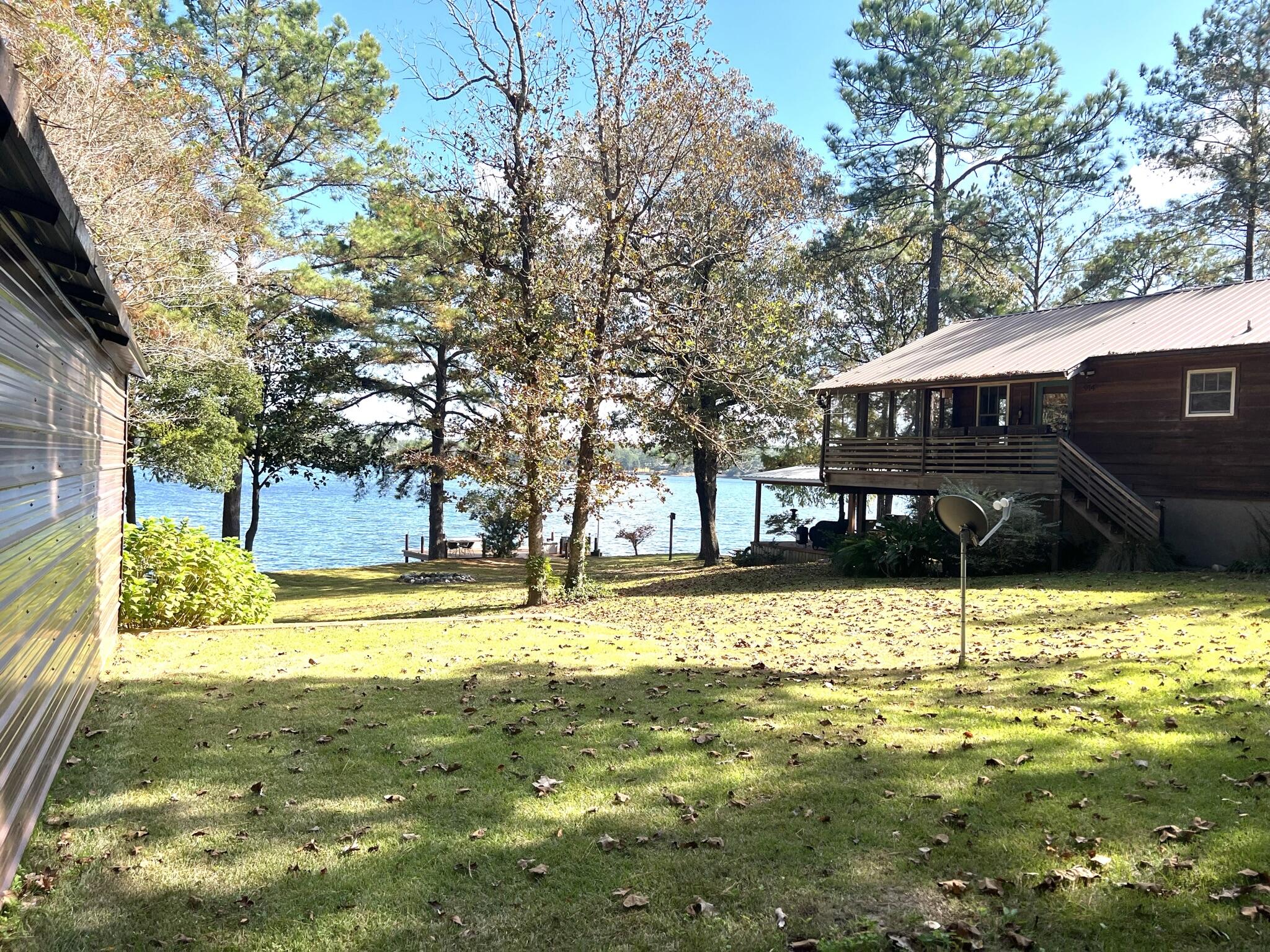 914 Spring Lake Road DeFuniak Springs, FL 32433 - Photo 65 of 78 a view of a swimming pool with a patio