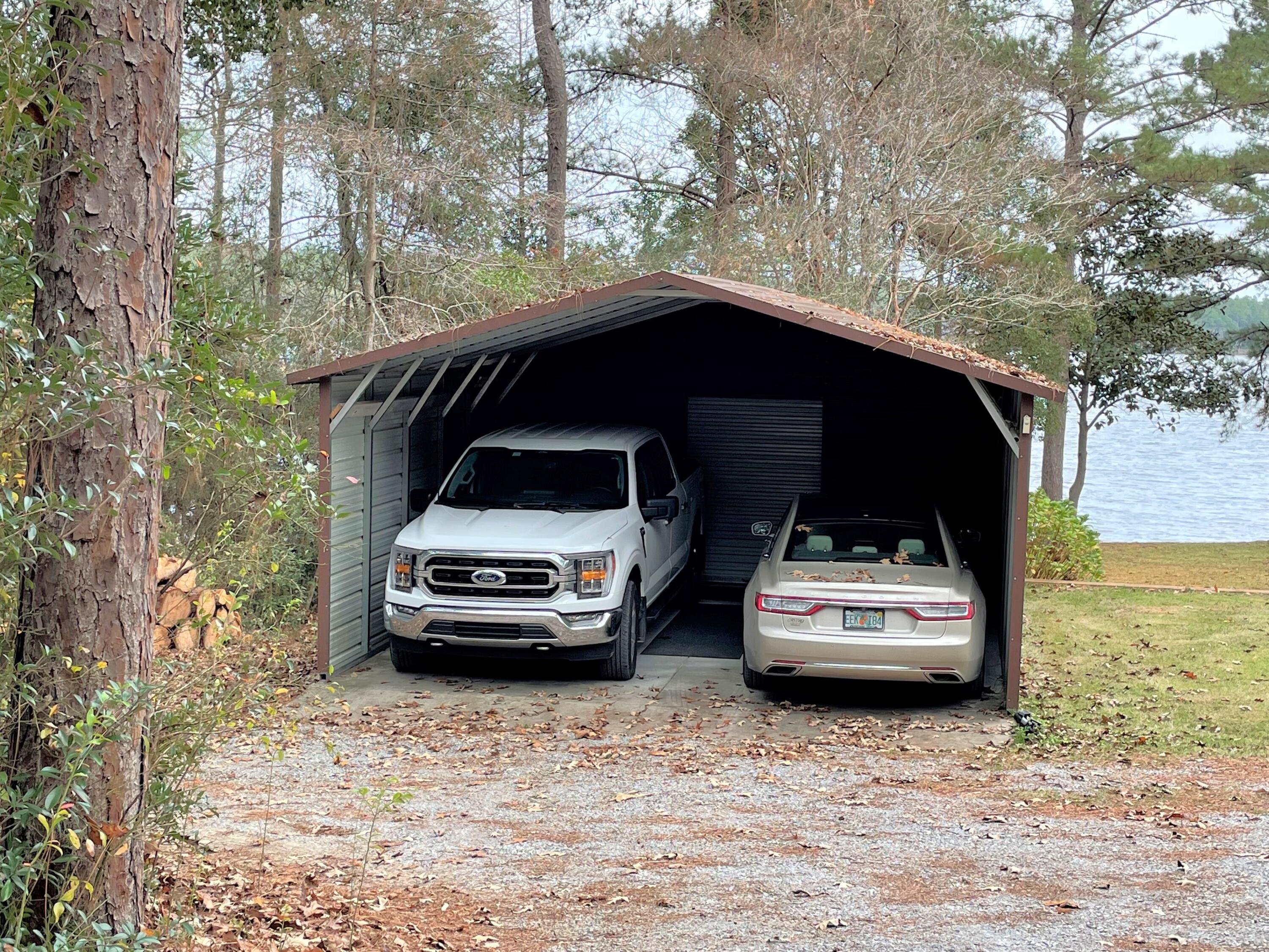 914 Spring Lake Road DeFuniak Springs, FL 32433 - Photo 69 of 78 a car parked in front of a house