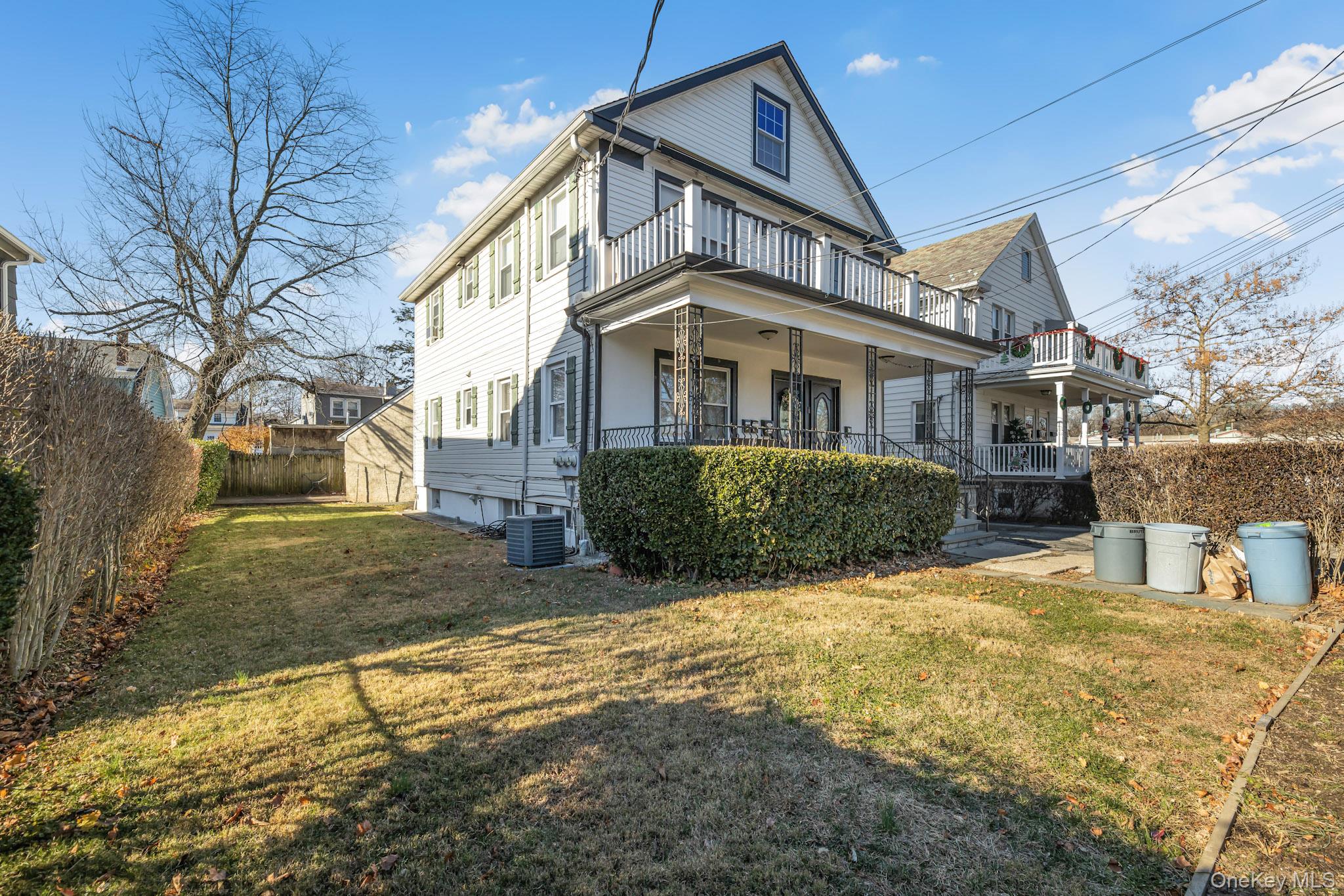 168 Stephenson Boulevard New Rochelle, NY 10801 - Photo 3 of 21 Back of house with a porch