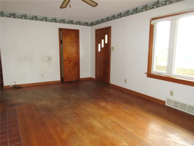 an empty room with windows