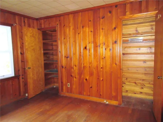 a bathroom with a sink toilet and mirror